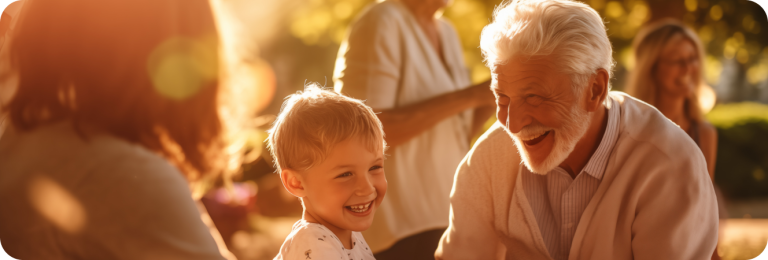 grandfather and grandson with family